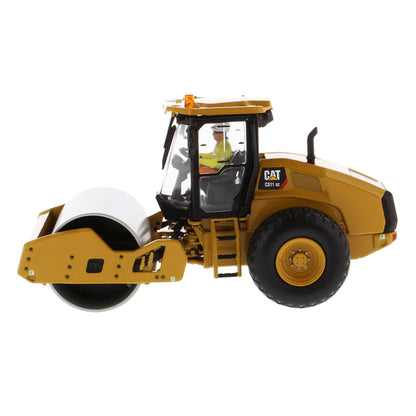 Model of a Caterpillar CS11 GC Smooth Drum Vibratory Soil Compactor w/Enclosed Cab on a White Background