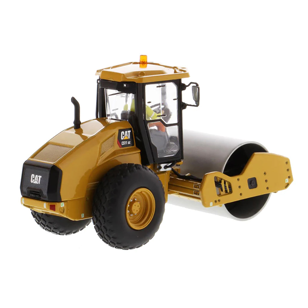 Model of a Caterpillar CS11 GC Smooth Drum Vibratory Soil Compactor w/Enclosed Cab on a White Background