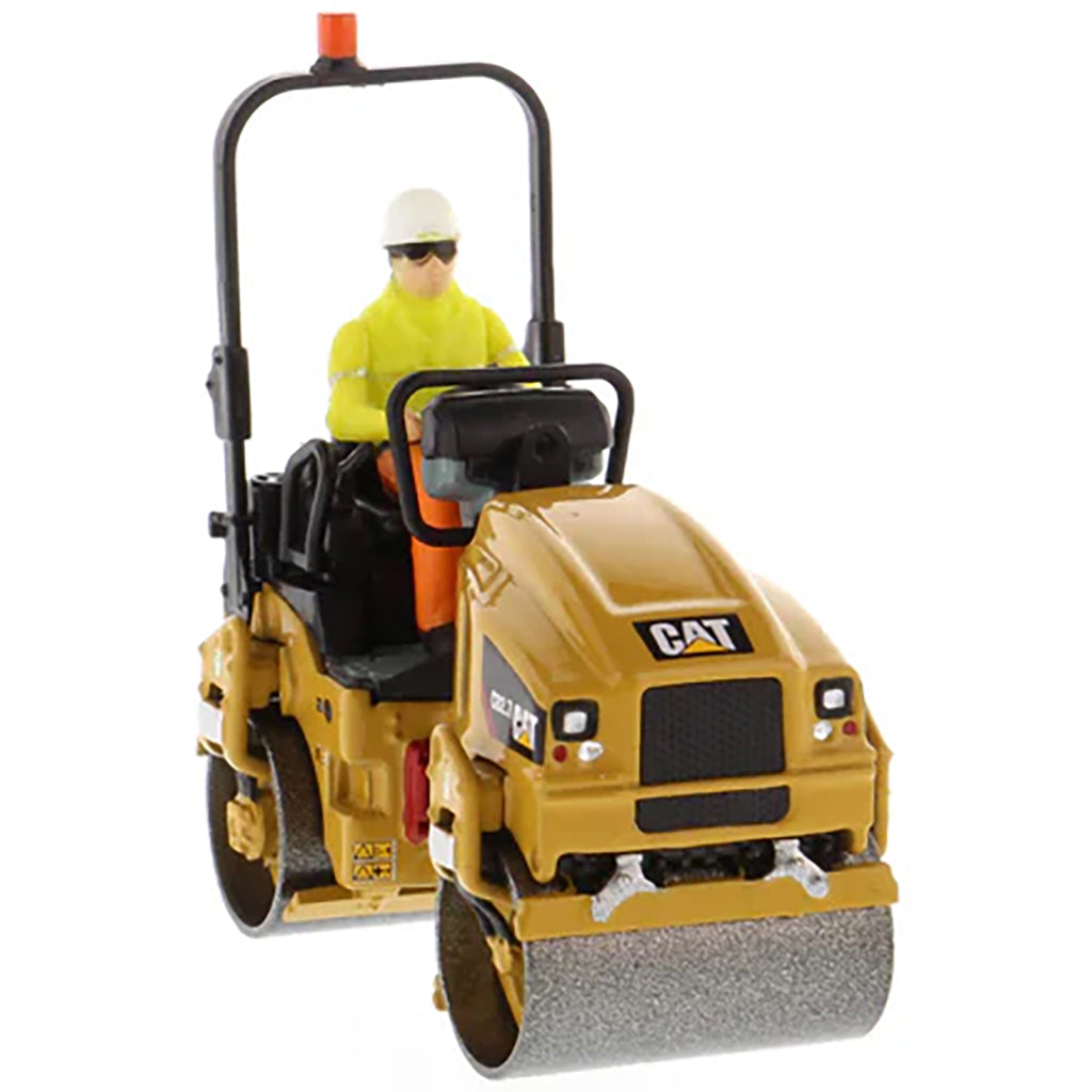Model of a Caterpillar CB-2.7 Tandem Vibratory Road Roller with Operator on a White Background 