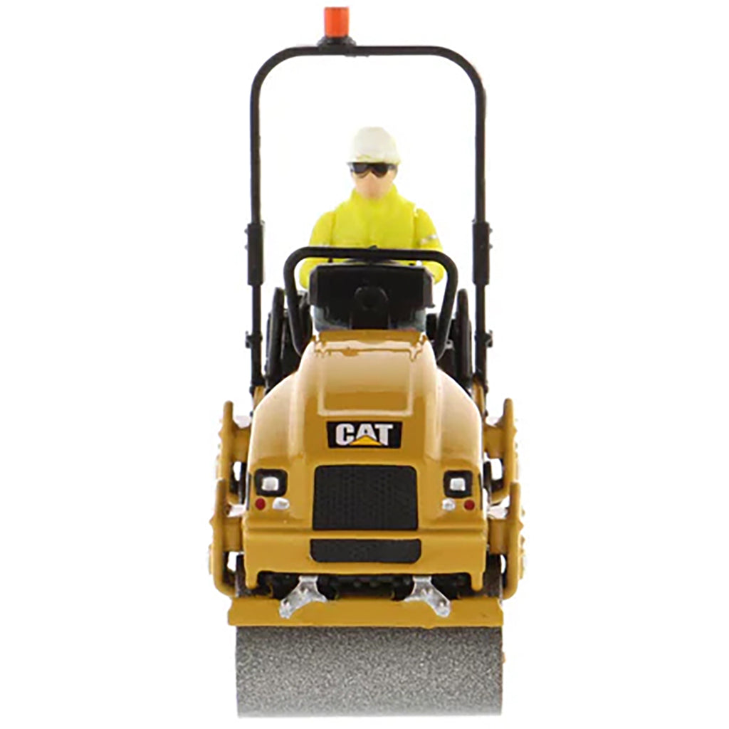 Model of a Caterpillar CB-2.7 Tandem Vibratory Road Roller with Operator on a White Background 