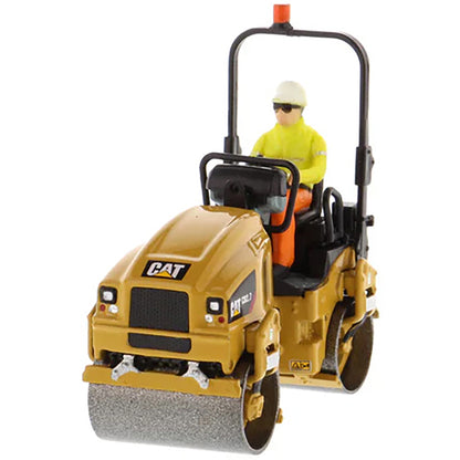 Model of a Caterpillar CB-2.7 Tandem Vibratory Road Roller with Operator on a White Background 