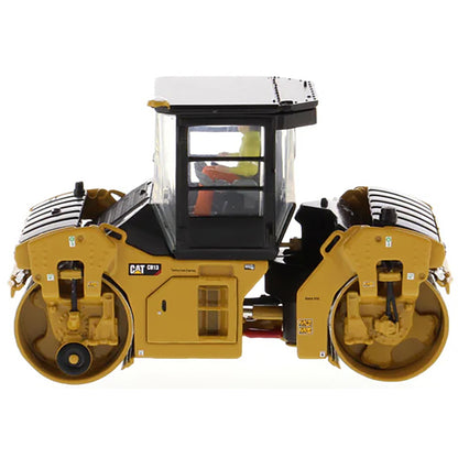 Model of a Caterpillar CB-13 Tandem Vibratory Roller w/Enclosed Cab Road Roller on a White Background