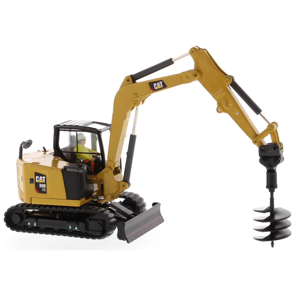 Model of a Caterpillar 308 CR Mini Hydraulic Excavator with Operator on a White Background