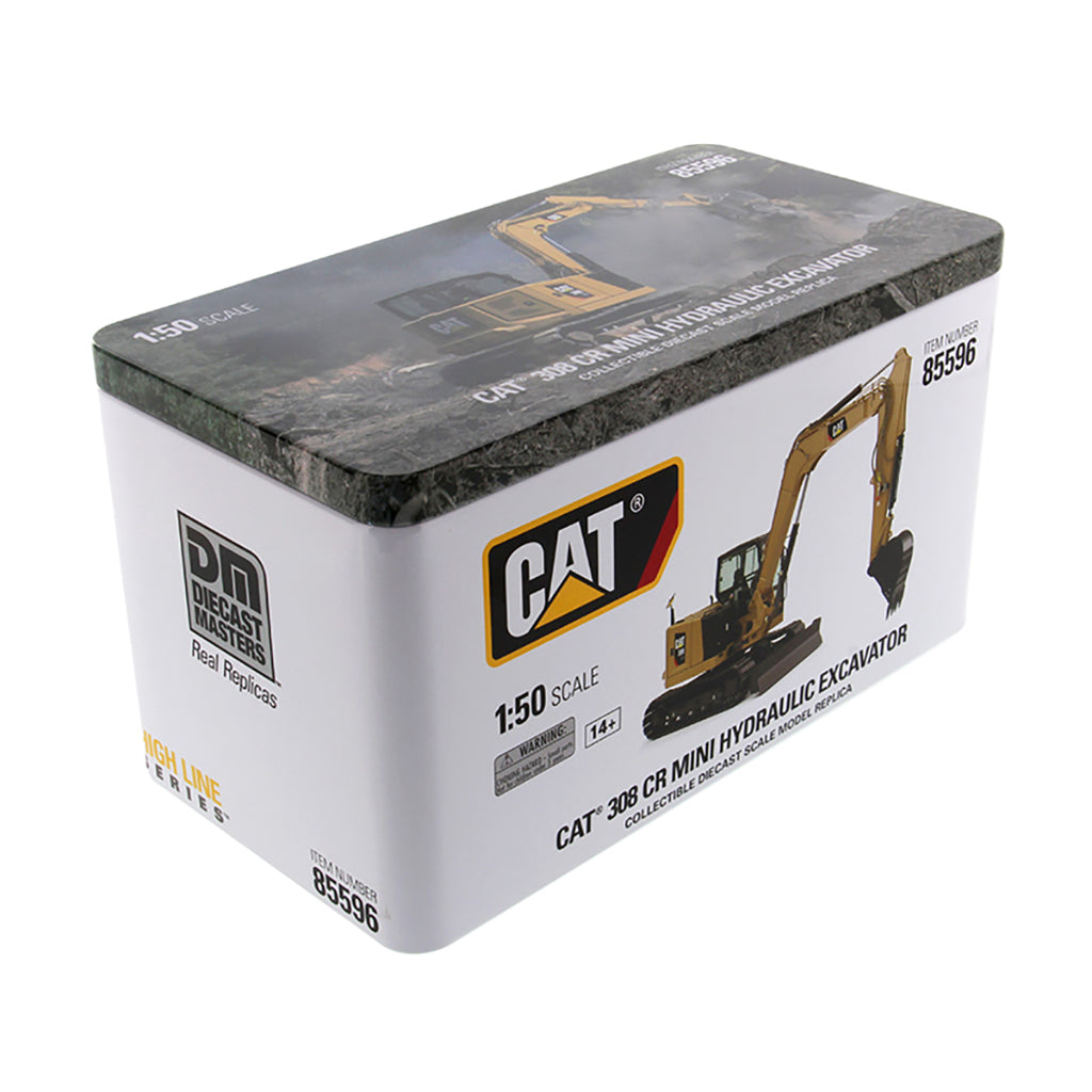 Box packaging of a Caterpillar (CAT) model excavator toy on a white background