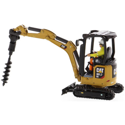 Model of a Next Generation Design Caterpillar 301.7 CR Mini Hydraulic Excavator with Operator on a White Background