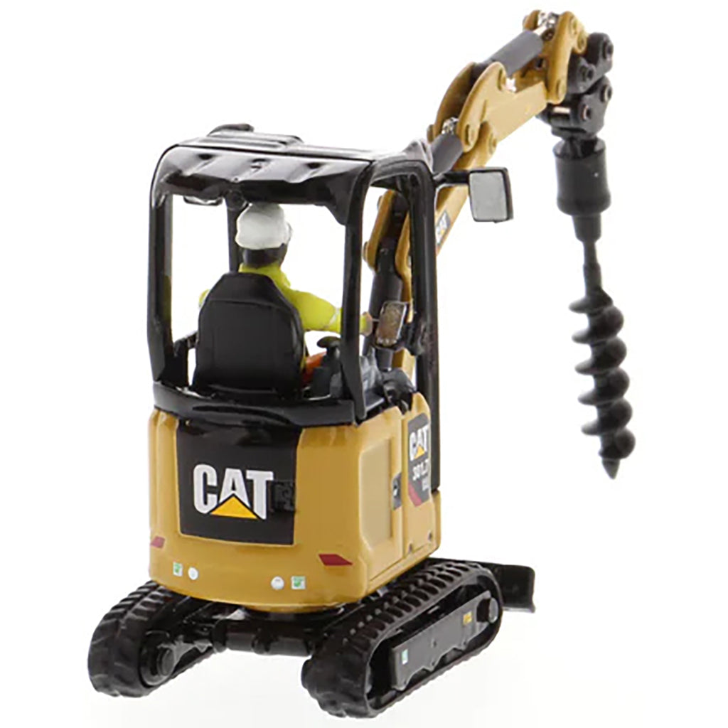 Model of a Next Generation Design Caterpillar 301.7 CR Mini Hydraulic Excavator with Operator on a White Background