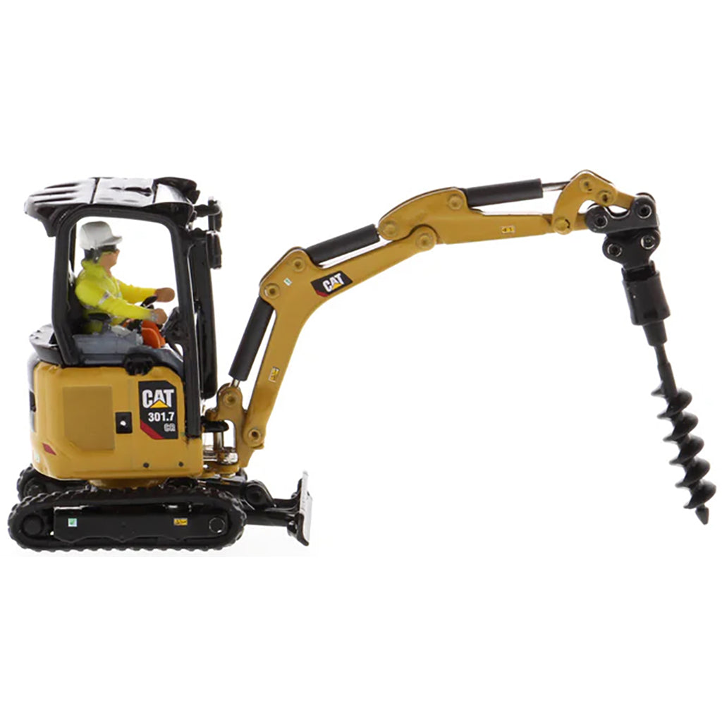 Model of a Next Generation Design Caterpillar 301.7 CR Mini Hydraulic Excavator with Operator on a White Background