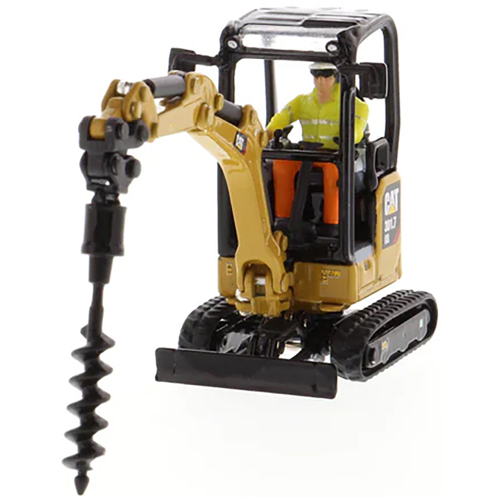 Model of a Next Generation Design Caterpillar 301.7 CR Mini Hydraulic Excavator with Operator on a White Background