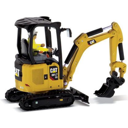 Model of a Next Generation Design Caterpillar 301.7 CR Mini Hydraulic Excavator with Operator on a White Background