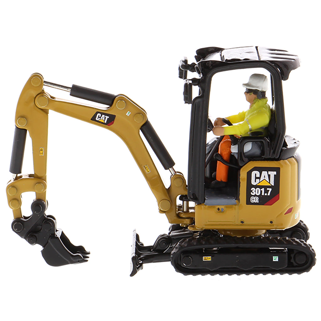 Model of a Next Generation Design Caterpillar 301.7 CR Mini Hydraulic Excavator with Operator on a White Background