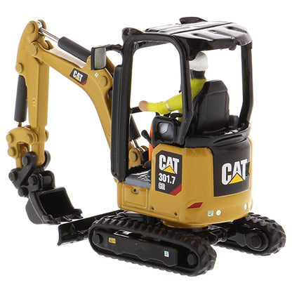 Model of a Next Generation Design Caterpillar 301.7 CR Mini Hydraulic Excavator with Operator on a White Background