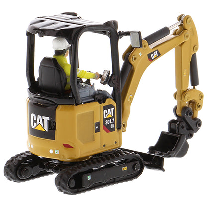 Model of a Next Generation Design Caterpillar 301.7 CR Mini Hydraulic Excavator with Operator on a White Background