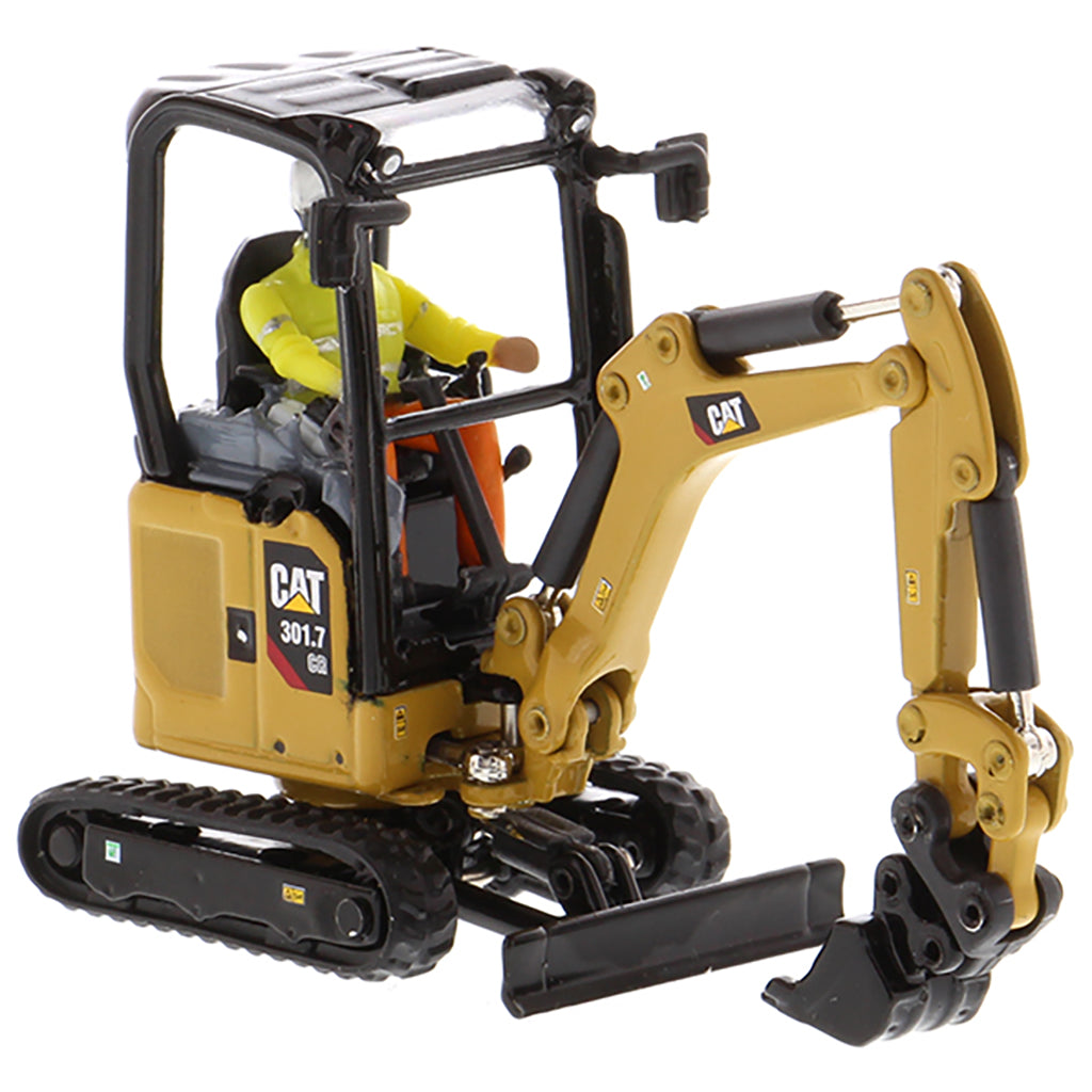 Model of a Next Generation Design Caterpillar 301.7 CR Mini Hydraulic Excavator with Operator on a White Background