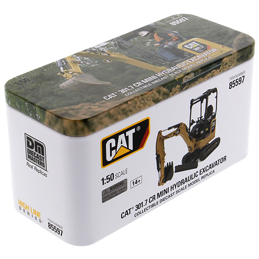 Model excavator packaging with CAT logo on a white background