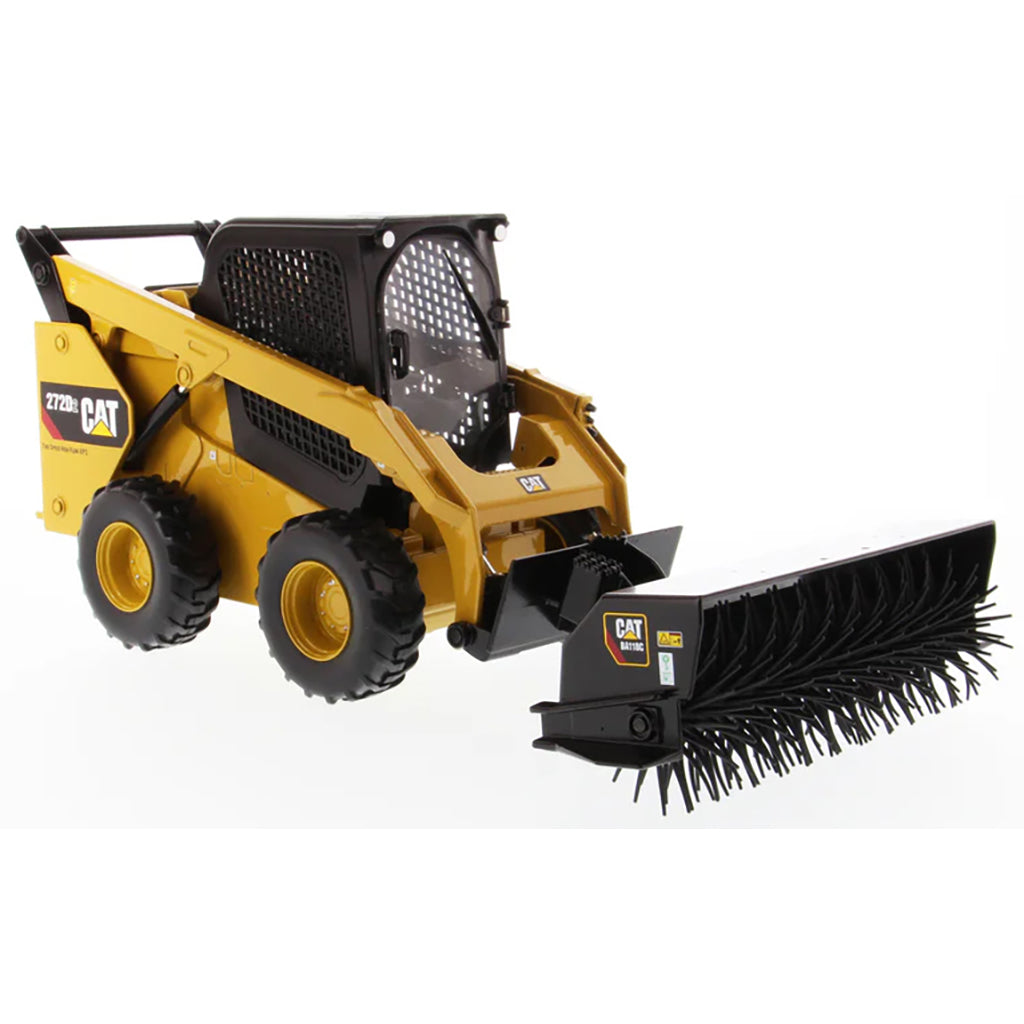 Model of a Caterpillar 272D2 Skid-Steer Loader with Wire Brush Attachment on a White Background