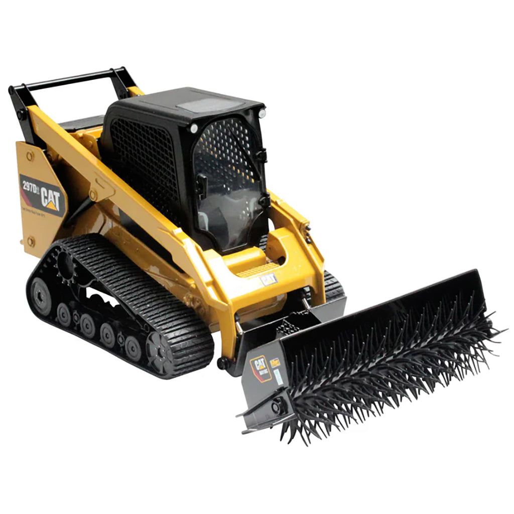 Model of a Caterpillar 297D2 Compact Track Loader with Wire Brush Attachment on a White Background