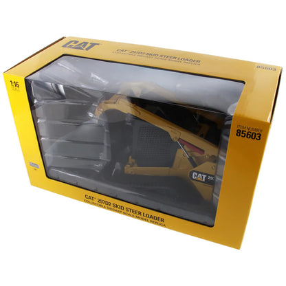 Model compact track loader in packaging with 'Cat' branding on a white background