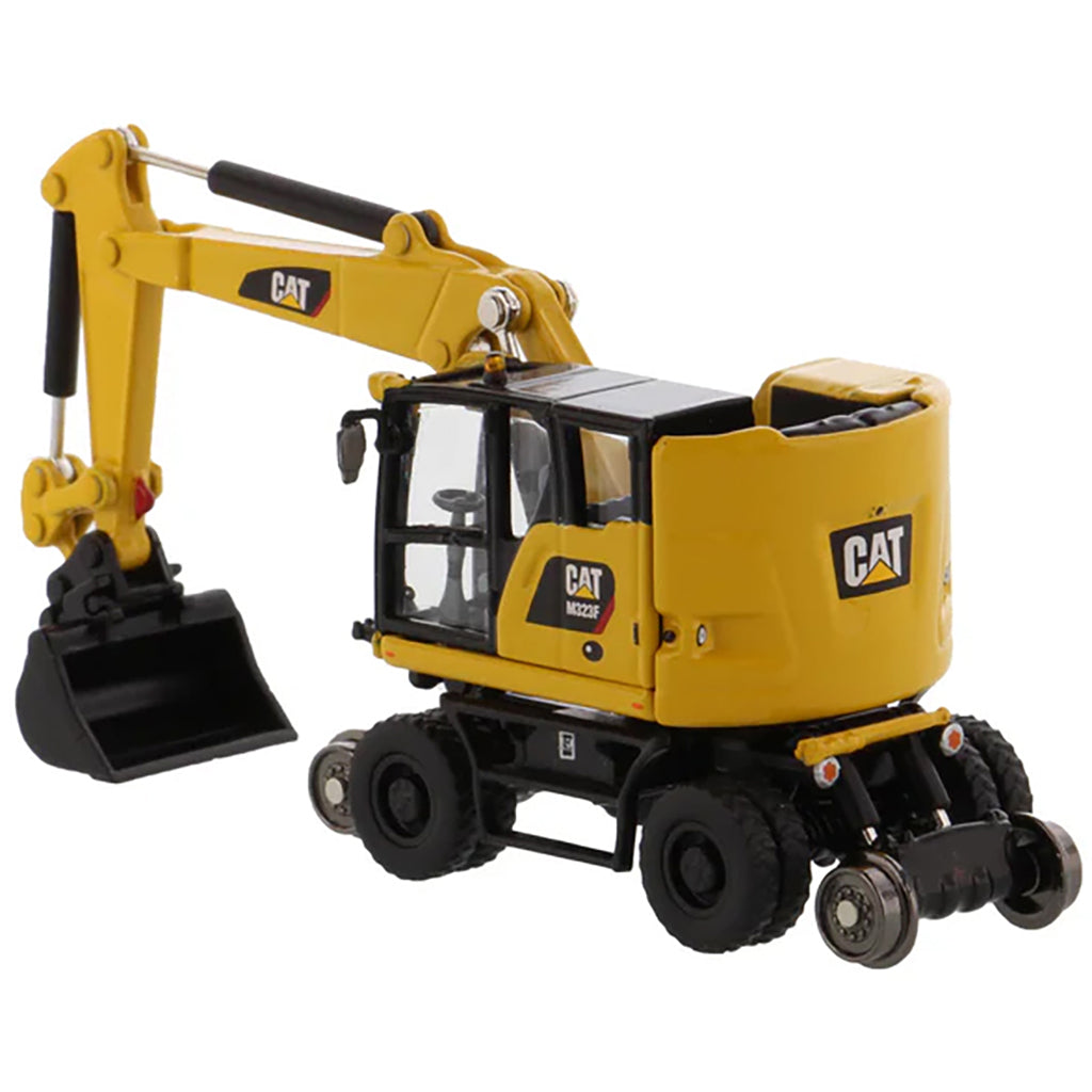 Model of a Safety Yellow Caterpillar M323F Railroad Wheeled Excavator on a White Background