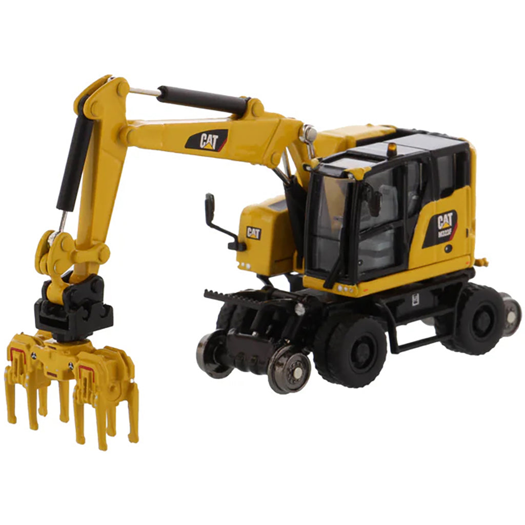 Model of a Safety Yellow Caterpillar M323F Railroad Wheeled Excavator on a White Background