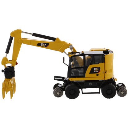 Model of a Safety Yellow Caterpillar M323F Railroad Wheeled Excavator on a White Background
