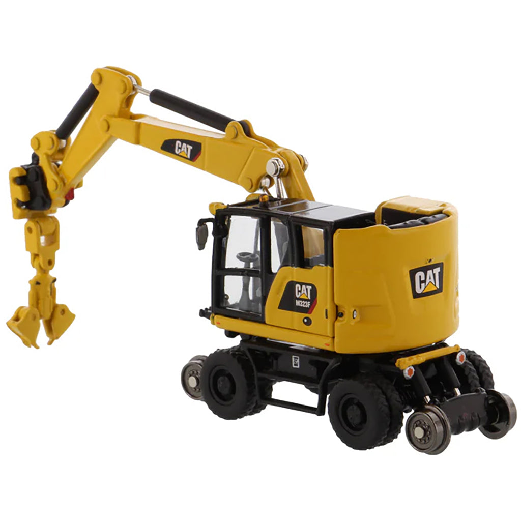 Model of a Safety Yellow Caterpillar M323F Railroad Wheeled Excavator on a White Background