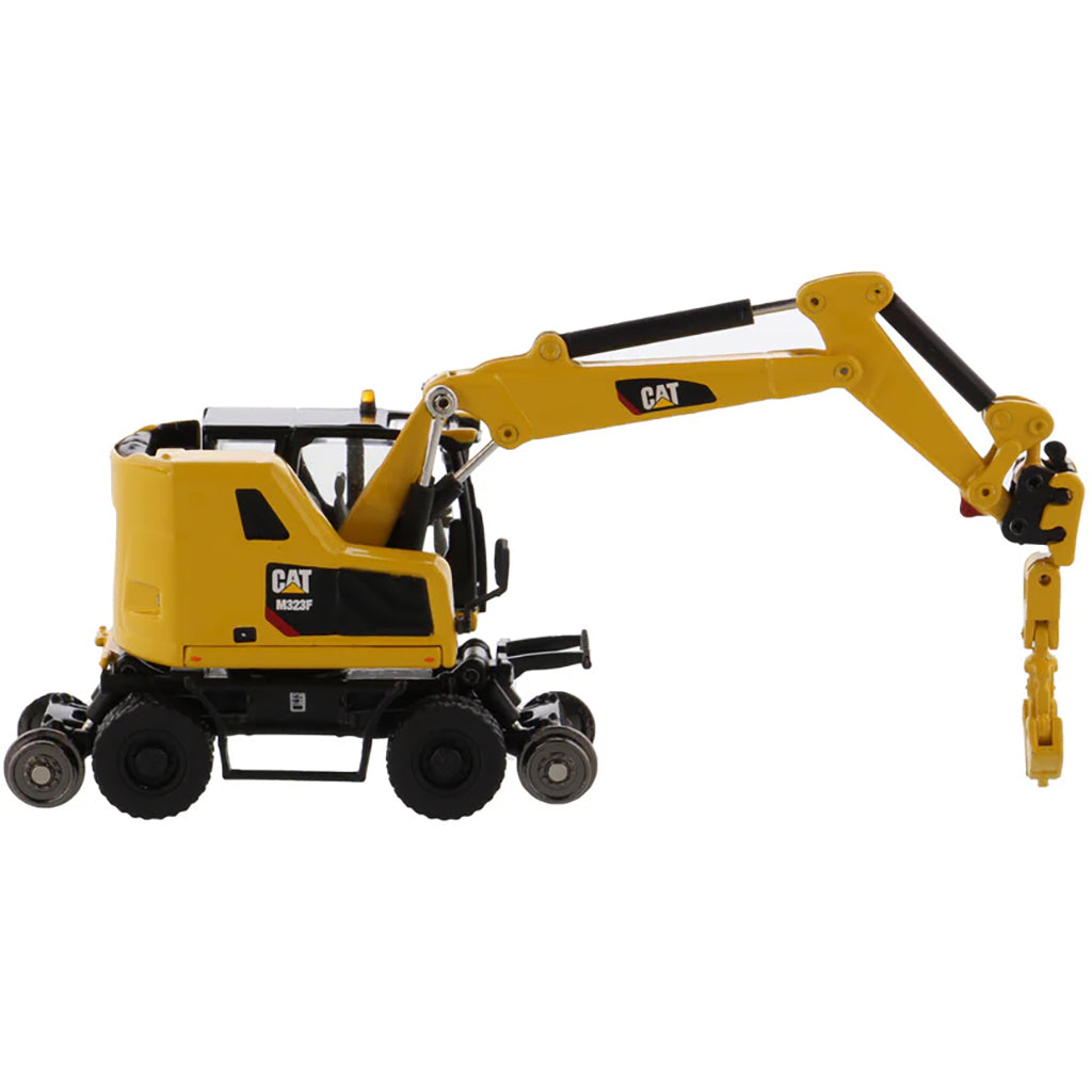 Model of a Safety Yellow Caterpillar M323F Railroad Wheeled Excavator on a White Background