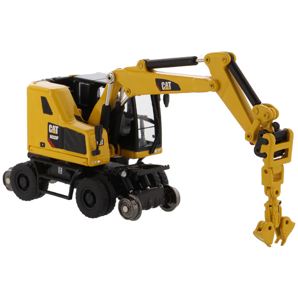 Model of a Safety Yellow Caterpillar M323F Railroad Wheeled Excavator on a White Background