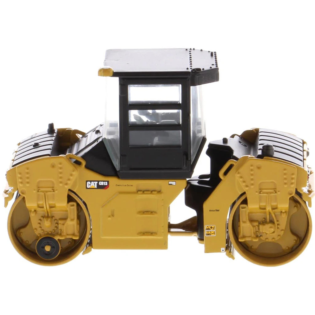 Model of a Caterpillar CB-13 Tandem Vibratory Roller w/Enclosed Cab on a White Background