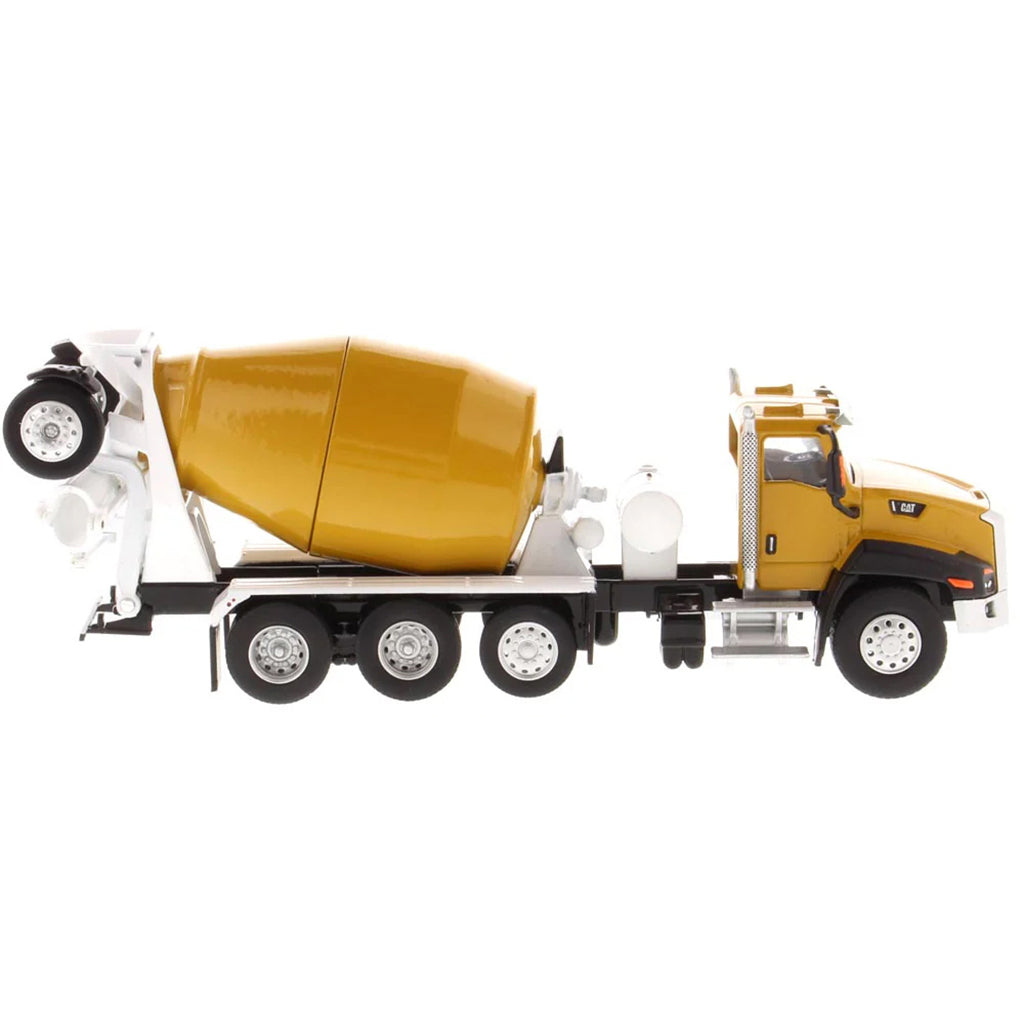 Model of a yellow cement mixer truck on a white background