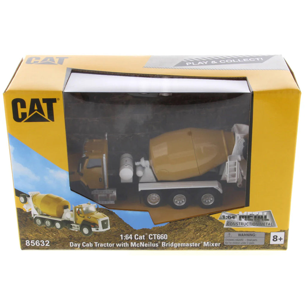 Boxed toy Cat construction vehicle with mixer on a white background