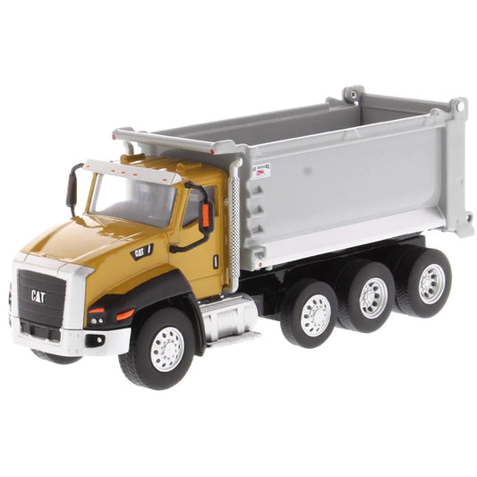 Model dump truck with yellow cab and gray bed on a white background