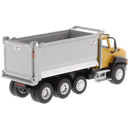 Model dump truck with a gray bed and yellow cab on a white background