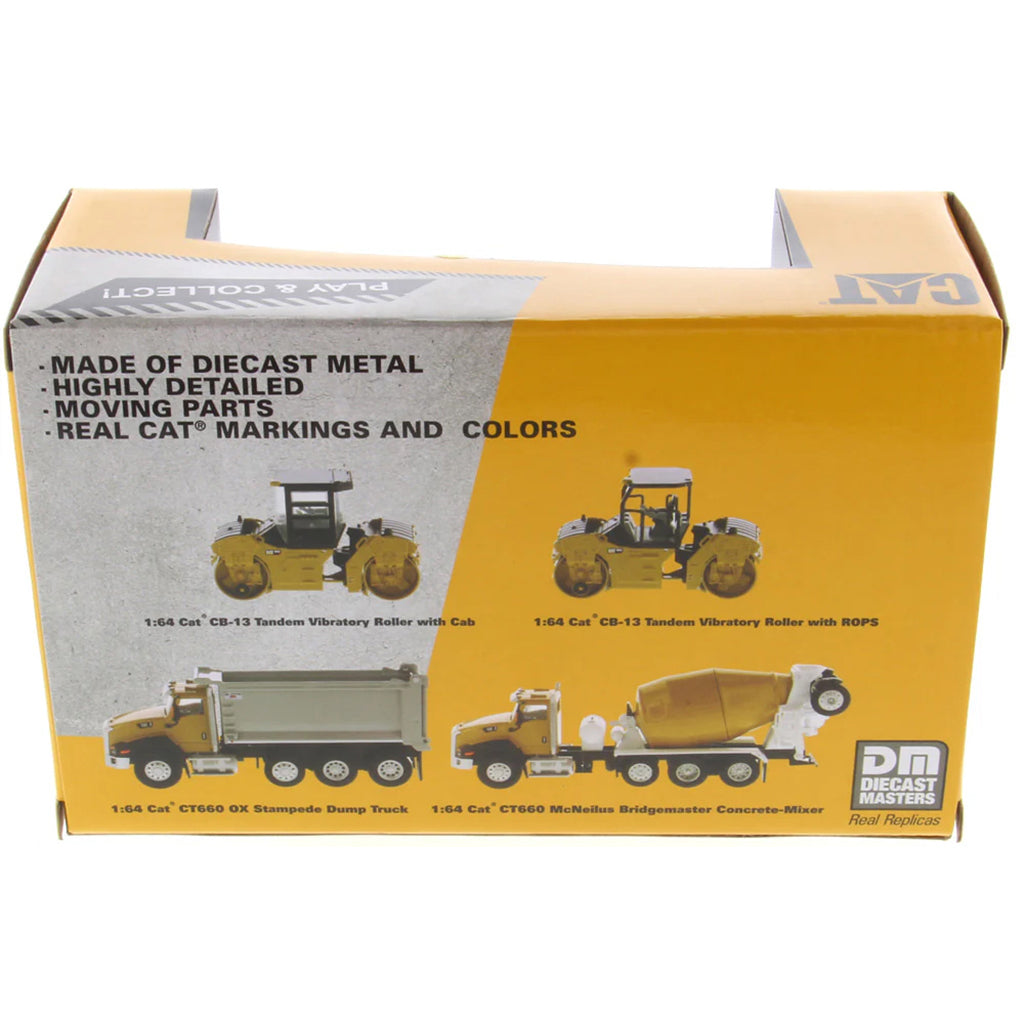 Box of Diecast Masters construction vehicles with toy models on a white background