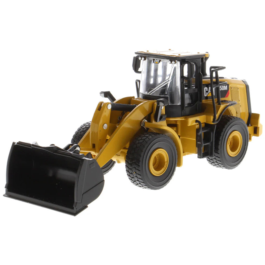 Model of a Caterpillar 950M Wheel Loader with Log Grappler and Longs on a White Background