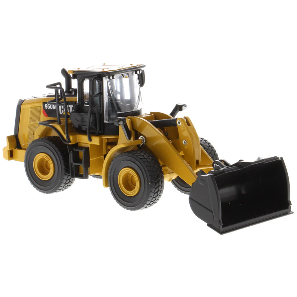 Model of a Caterpillar 950M Wheel Loader with Log Grappler and Longs on a White Background