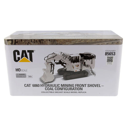 Model of a Caterpillar 6060F Front Shovel Mining Excavator in a Coal Configuration Painted White in a Tin Box Packaging on a White Background