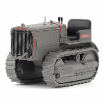 Model of a Caterpillar Twenty Crawler Tractor on a White Background