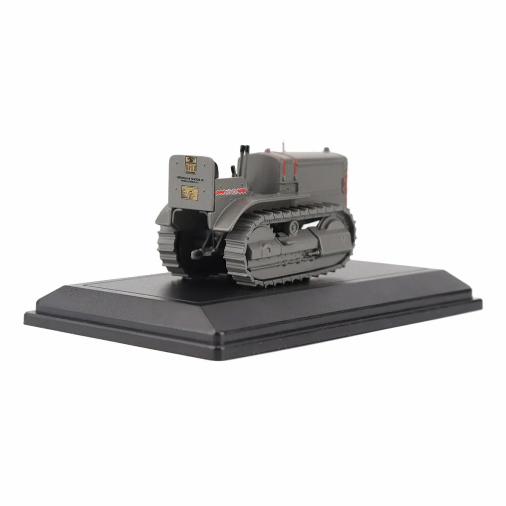 Model of a Caterpillar Twenty Crawler Tractor Mounted on a Black Base Plate on a White Background