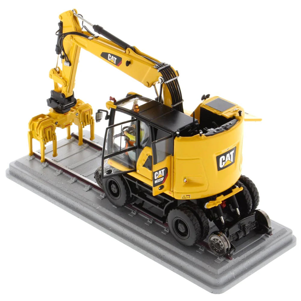Model of a Caterpillar M323F Railroad Wheeled Excavator - Safety Yellow Version on a White Background