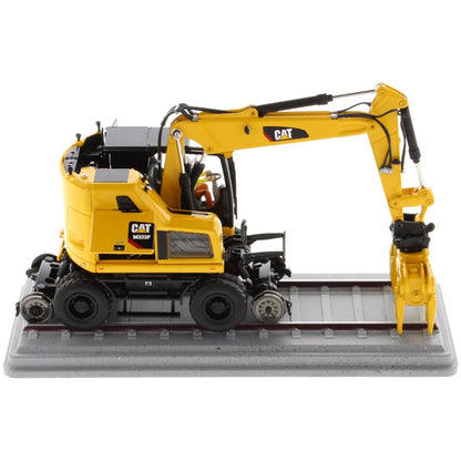 Model of a Caterpillar M323F Railroad Wheeled Excavator - Safety Yellow Version on a White Background