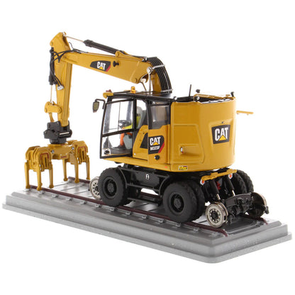 Model of a Caterpillar M323F Railroad Wheeled Excavator - CAT Yellow Version on a White Background