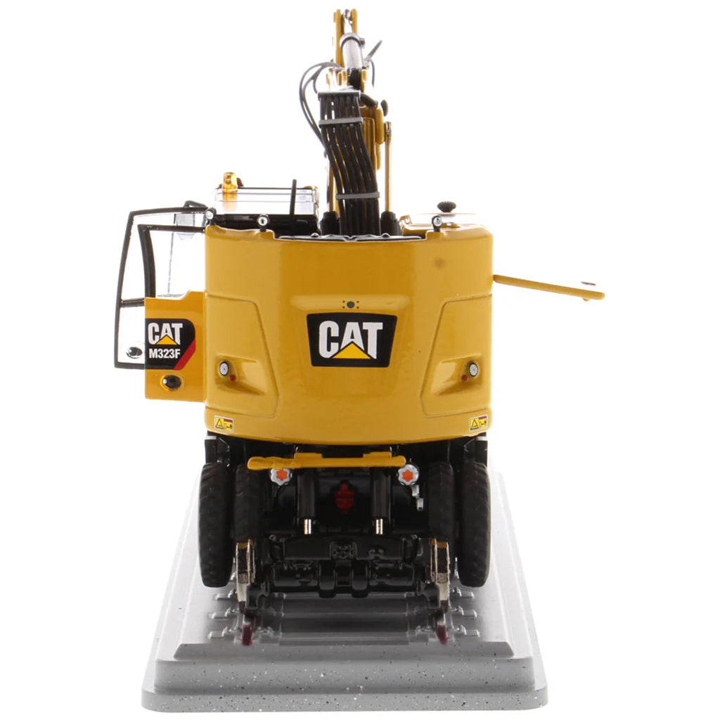 Model of a Caterpillar M323F Railroad Wheeled Excavator - CAT Yellow Version on a White Background