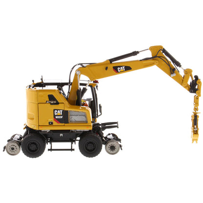 Model of a Caterpillar M323F Railroad Wheeled Excavator - CAT Yellow Version on a White Background