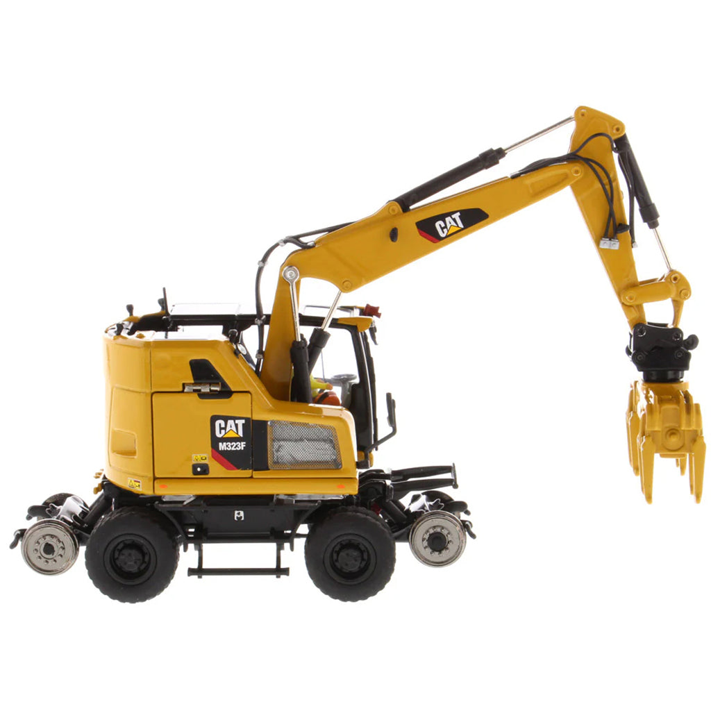 Model of a Caterpillar M323F Railroad Wheeled Excavator - CAT Yellow Version on a White Background
