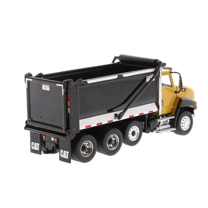 Model dump truck with black bed and yellow body on a white background