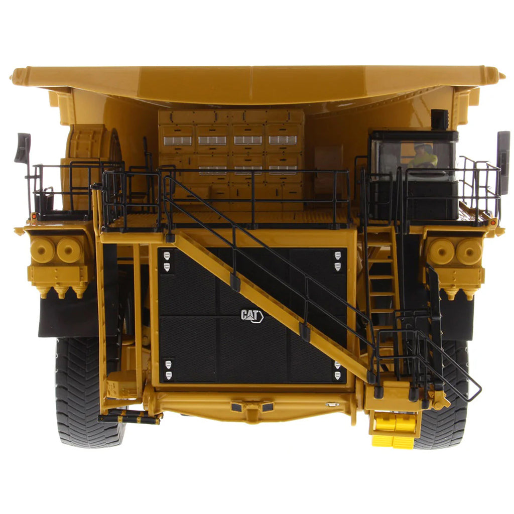 Model of Caterpillar 794 AC Mining Dump Truck on a White Background