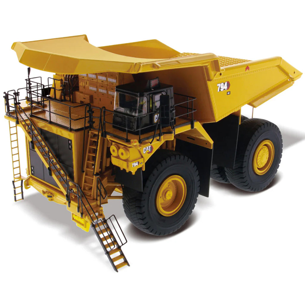 Model of Caterpillar 794 AC Mining Dump Truck on a White Background