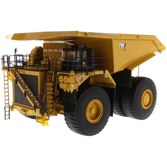 Model of a Large Caterpillar 798 AC Off Highway Electric Drive Mining Dump Truck on a White Background