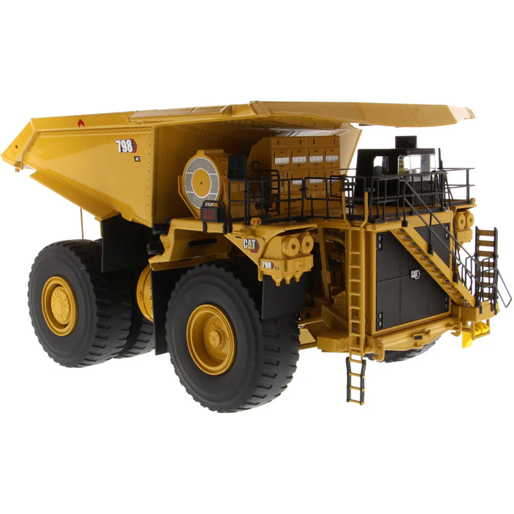 Model of a Large Caterpillar 798 AC Off Highway Electric Drive Mining Dump Truck on a White Background