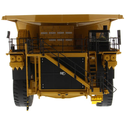 Model of a Large Caterpillar 798 AC Off Highway Electric Drive Mining Dump Truck on a White Background